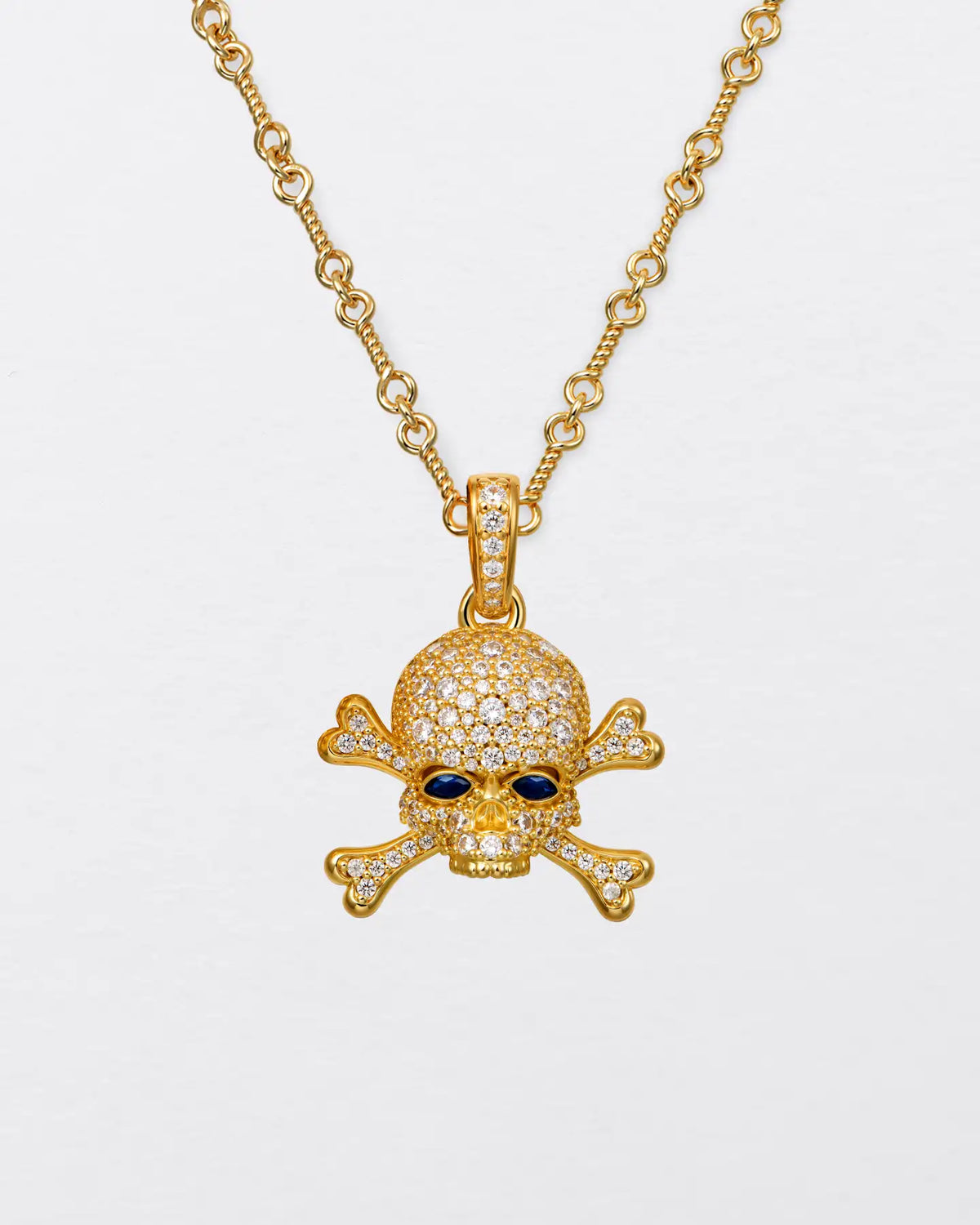 22K Blue-Eyed Skull Pendant